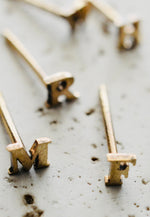 Gold letter studs